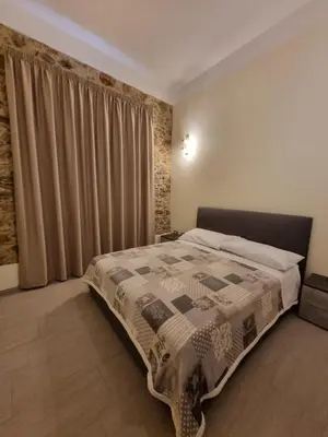 Letto o letti in una camera di Sa Costera Guest House