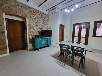 TV o dispositivi per l'intrattenimento presso Sa Costera Guest House