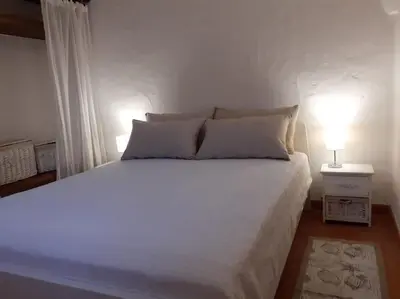 Letto o letti in una camera di Villa del Nuraghe with fantastic sea view