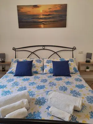 Letto o letti in una camera di Villetta Chiara