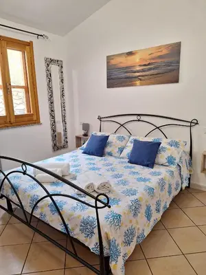 Letto o letti in una camera di Villetta Chiara