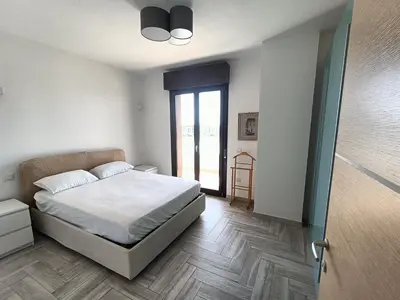 Letto o letti in una camera di Casa Fanna