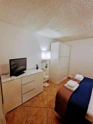 Letto o letti in una camera di Casa vacanza Castello