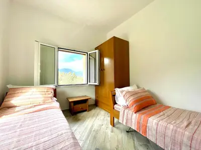 Letto o letti in una camera di Green House
