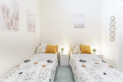 Letto o letti in una camera di Fiore Dell'Onda