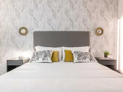 Letto o letti in una camera di Repubblica appartamento design con 2 camere letto