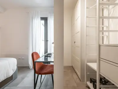 Letto o letti in una camera di Repubblica appartamento design con 2 camere letto