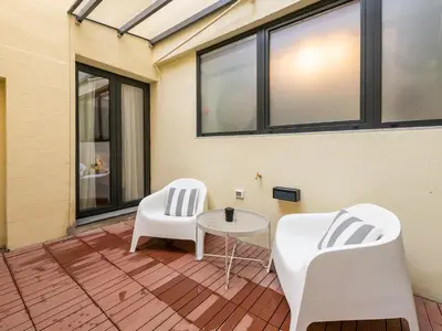 Area soggiorno di Repubblica appartamento design con 2 camere letto