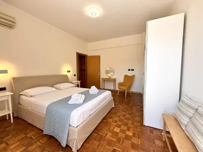 Letto o letti in una camera di Monte Urpinu Premium Apartment