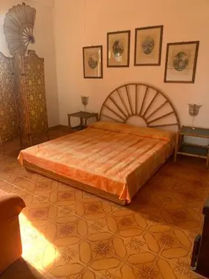 Letto o letti in una camera di Villa Gioia