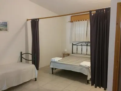 Letto o letti in una camera di Agriturismo Sarrabus