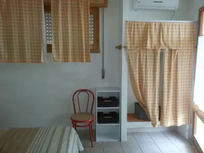 Letto o letti in una camera di Agriturismo Sarrabus