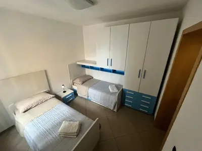 Letto o letti in una camera di Sardinia Costa Ovest