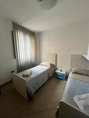 Letto o letti in una camera di Sardinia Costa Ovest
