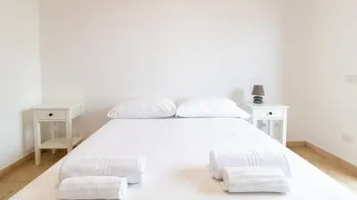 Letto o letti in una camera di Civico 89- Urban Retreat