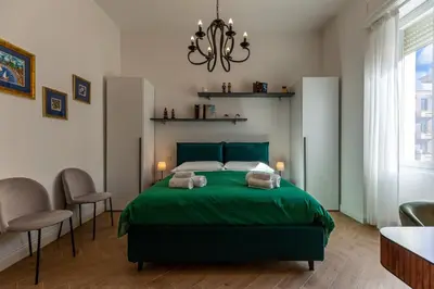 Letto o letti in una camera di Ginett's House