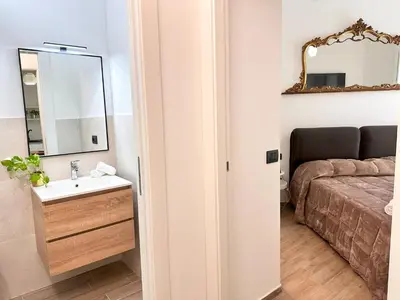 Letto o letti in una camera di Carloforte al Centro di Cagliari