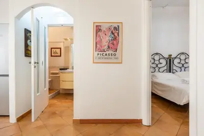 Letto o letti in una camera di Oasi Urbana con Terrazza e Vista