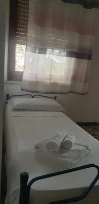 Letto o letti in una camera di Casa Alice vicino al mare