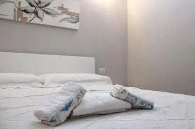 Letto o letti in una camera di Casa Franca