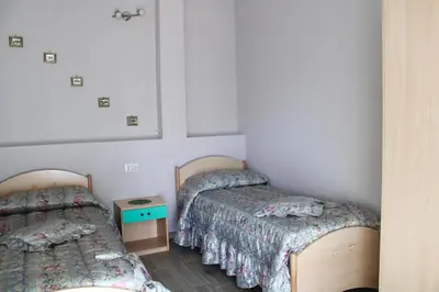 Letto o letti in una camera di Casa Franca
