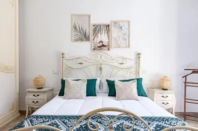 Letto o letti in una camera di GuestHost - Sa Domo d' Amare - Comely Apartment with Parking!