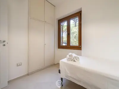 Letto o letti in una camera di Seaside Pineta Retreat