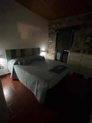 Letto o letti in una camera di Cala Ginepro Tortoli