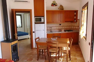 Cucina o angolo cottura di Bari Sardo Le More Suite 1