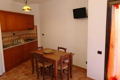 Cucina o angolo cottura di Bari Sardo Le More Suite 2