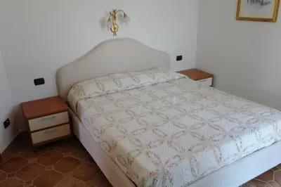 Letto o letti in una camera di Bari Sardo Le More Suite 2