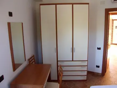 Letto o letti in una camera di Bari Sardo Le More Suite 2