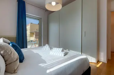 Letto o letti in una camera di Villa Marcello