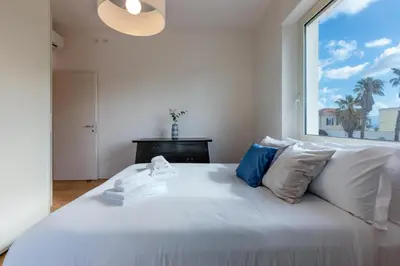 Letto o letti in una camera di Villa Marcello
