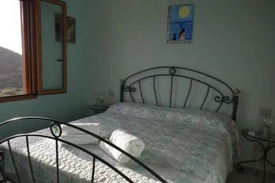 Letto o letti in una camera di Holiday home Riccio di Mare Sardinia