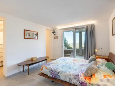Letto o letti in una camera di Villa Arcobaleno sul mare