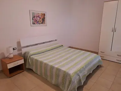 Letto o letti in una camera di CASA IL GIARDINO