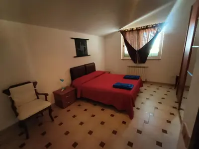 Letto o letti in una camera di Casa vacanze Medau Rubiu