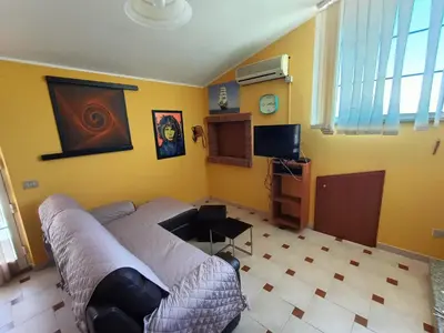TV o dispositivi per l'intrattenimento presso Casa vacanze Medau Rubiu