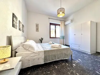 Letto o letti in una camera di Orchid House