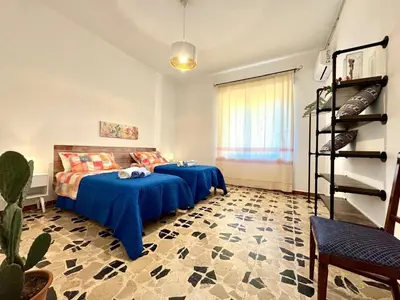 Letto o letti in una camera di Orchid House