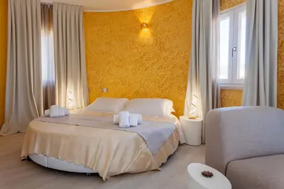 Letto o letti in una camera di Glorian Hotel