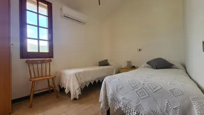 Letto o letti in una camera di Casa del Mare