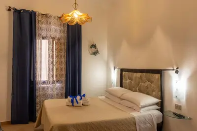 Letto o letti in una camera di Casa Vacanza IgleHouse