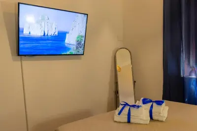 TV o dispositivi per l'intrattenimento presso Casa Vacanza IgleHouse