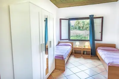 Letto o letti in una camera di Su Tuvulu 1