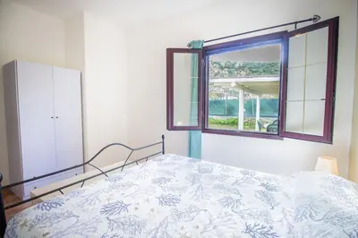 Letto o letti in una camera di Su Tuvulu 1