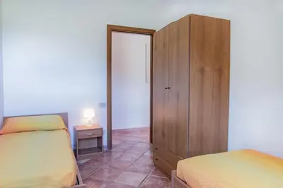 Letto o letti in una camera di Su Tuvulu 2
