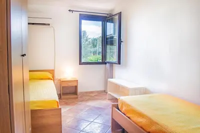 Letto o letti in una camera di Su Tuvulu 2