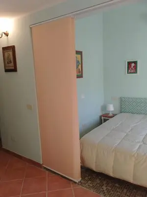 Letto o letti in una camera di New! La Ginestra,casa vacanze bifamiliare in montagna-Seulo Sardegna